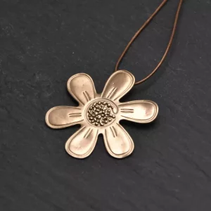 Sautoir fleur marguerite doré